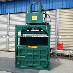 Déchets de pâte à papier/carton carton/déchets de bouteilles en plastique/pneus métalliques/vieux vêtements/foin paille d'herbe/presse à balles de cerclage d'emballage hydraulique automatique